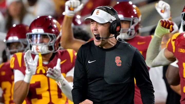 Oct 11, 2025; Los Angeles, California, USA; USC Trojans head coach Lincoln Riley celebrates after kicker Ryon Sayeri (48) hit a 54-yard field goal in the second half against the Michigan Wolverines at United Airlines Field at the Los Angeles Memorial Coliseum. Mandatory Credit: Jayne Kamin-Oncea-Imagn Images Oct 11, 2025; Los Angeles, California, USA; USC Trojans head coach Lincoln Riley celebrates after kicker Ryon Sayeri (48) hit a 54-yard field goal in the second half against the Michigan Wolverines at United Airlines Field at the Los Angeles Memorial Coliseum. Mandatory Credit: Jayne Kamin-Oncea-Imagn Images