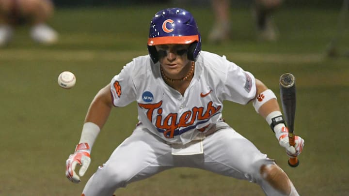 Jun 2, 2024; Clemson, South Carolina, USA; Clemson sophomore Cam Cannarella (10) watches a ball go by him on a pitch from Coastal Carolina University during the bottom of the eighth inning of the NCAA baseball Clemson Regional at Doug Kingsmore Stadium in Clemson. 