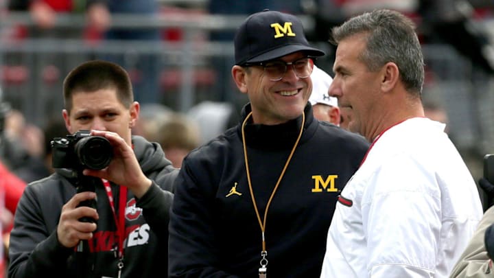 Urban Meyer discussed Jim Harbaugh's NCAA suspension and whether it should translate to the NFL.