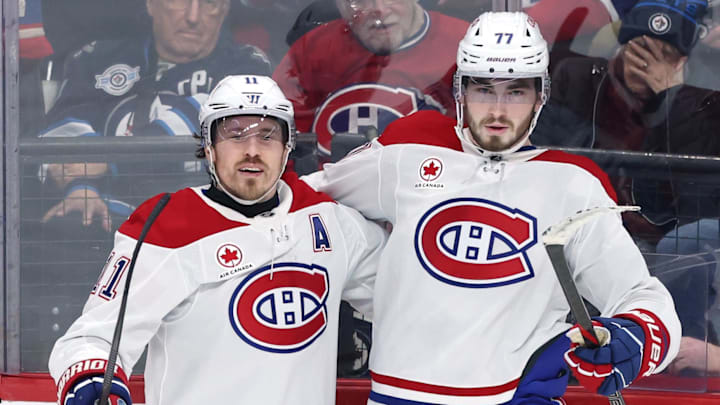 Feb 4, 2026; Winnipeg, Manitoba, CAN; Montreal Canadiens right wing Brendan Gallagher (11) celebrates a goal against the Winnipeg Jets with center Kirby Dach (77) in the third period at Canada Life Centre. Mandatory Credit: James Carey Lauder-Imagn Images