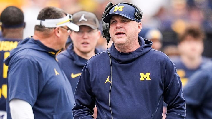 Michigan offensive coordinator Chip Lindsey talks to players on the sideline during the first half of the spring game at Michigan Stadium in Ann Arbor on Saturday, April 19, 2025.