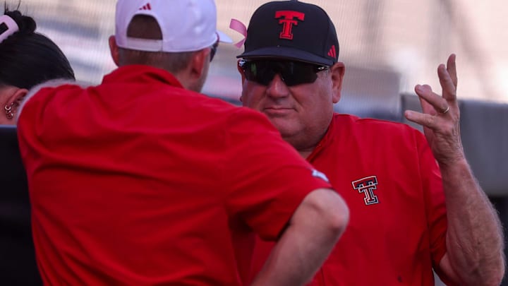 Texas Tech head coach Gerry Glasco talks to assistants during a non-conference softball game, Tuesday, April 28, 2026, at Tracy Sellers Field.