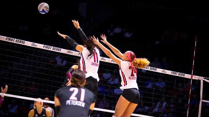 Louisville front line at the Net Louisville front line at the Net