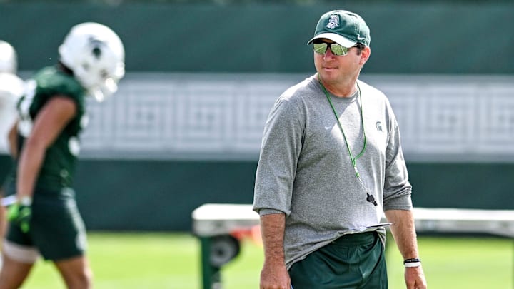 Michigan State's head coach Jonathan Smith watches over the action during the first day of football camp on Tuesday, July 30, 2024, in East Lansing.