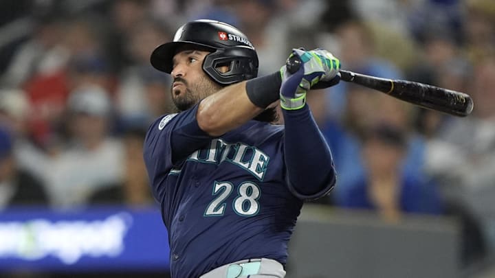 Oct 20, 2025; Toronto, Ontario, CAN; Seattle Mariners third baseman Eugenio Suarez (28) hits a single against the Toronto Blue Jays in the second inning during game seven of the ALCS round for the 2025 MLB playoffs at Rogers Centre. Mandatory Credit: John E. Sokolowski-Imagn Images Oct 20, 2025; Toronto, Ontario, CAN; Seattle Mariners third baseman Eugenio Suarez (28) hits a single against the Toronto Blue Jays in the second inning during game seven of the ALCS round for the 2025 MLB playoffs at Rogers Centre. Mandatory Credit: John E. Sokolowski-Imagn Images