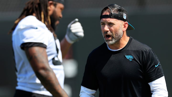Jacksonville Jaguars outside linebackers coach Bill Shuey coaches defensive end Andre Carter (97) during an organized team activity Tuesday, May 28, 2024 at EverBank Stadium’s Miller Electric Center in Jacksonville, Fla.