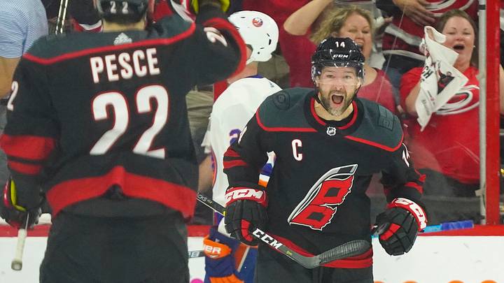 May 1, 2019; Raleigh, NC, USA; Carolina Hurricanes right wing Justin Williams (14) celebrates after scoring a goal against the New York Islanders during the third period in game three of the second round of the 2019 Stanley Cup Playoffs at PNC Arena. Mandatory Credit: James Guillory-USA TODAY Sports