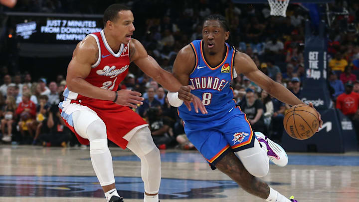 Apr 26, 2025; Memphis, Tennessee, USA; Oklahoma City Thunder forward Jalen Williams (8) dribbles as Memphis Grizzlies guard Desmond Bane (22) defends during the fourth quarter during game four for the first round of the 2024 NBA Playoffs at FedExForum. Mandatory Credit: Petre Thomas-Imagn Images