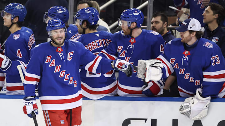 Mar 31, 2026; New York, New York, USA;  New York Rangers center J.T. Miller (8) celebrates with his teammates after scoring a goal in the first period against the New Jersey Devils at Madison Square Garden. Mandatory Credit: Wendell Cruz-Imagn Images