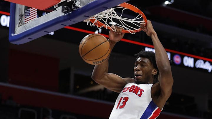 Mar 24, 2024; Detroit, Michigan, USA;  Detroit Pistons center James Wiseman (13) dunks in the second half against the New Orleans Pelicans  Little Caesars Arena. Mandatory Credit: Rick Osentoski-Imagn Images
