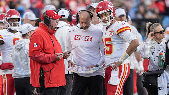 Nov 24, 2024; Charlotte, North Carolina, USA;  Kansas City Chiefs head coach Andy Reid talks with quarterback Patrick Mahomes (15) during a time out during the second half against the Carolina Panthers at Bank of America Stadium. Mandatory Credit: Jim Dedmon-Imagn Images
