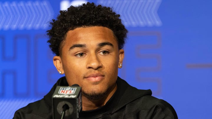 Mar 5, 2022; Indianapolis, IN, USA; Washington defensive back Trent McDuffie (DB26) talks to the media during the 2022 NFL Scouting Combine at Lucas Oil Stadium. Mandatory Credit: Trevor Ruszkowski-Imagn Images
