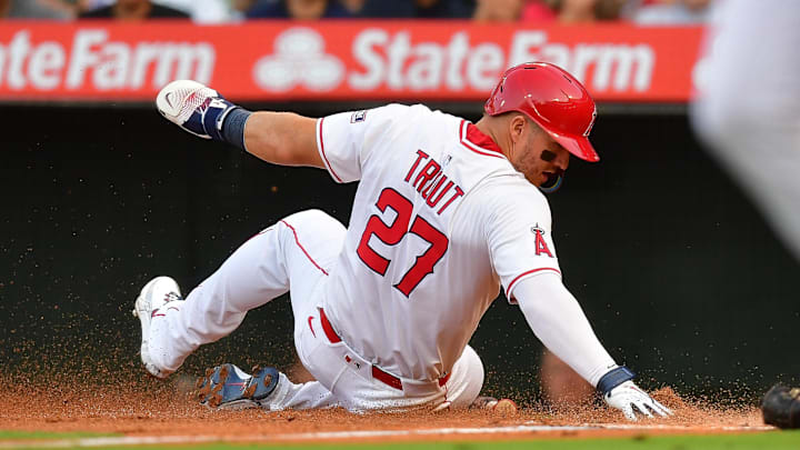 Angels designated hitter Mike Trout (27) scores a run against the Boston Red Sox during the first inning at Angel Stadium on June 23.
