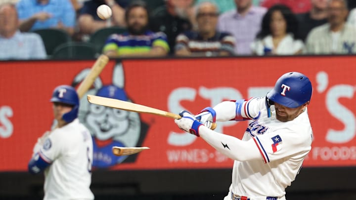 Apr 28, 2026; Arlington, Texas, USA;  Texas Rangers right fielder Brandon Nimmo (24) breaks his bat during the third inning against the New York Yankees at Globe Life Field. Mandatory Credit: Kevin Jairaj-Imagn Images