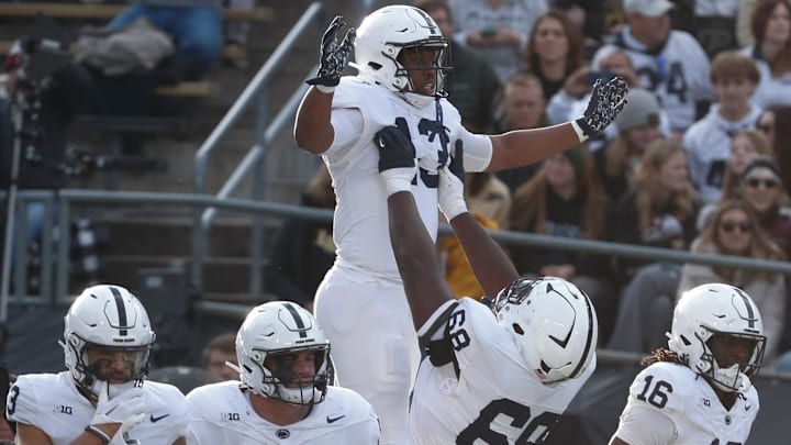 Penn State Nittany Lions running back Kaytron Allen (13) celebrates with teammates after scoring against the Purdue Boilermakers at Ross-Ade Stadium. 