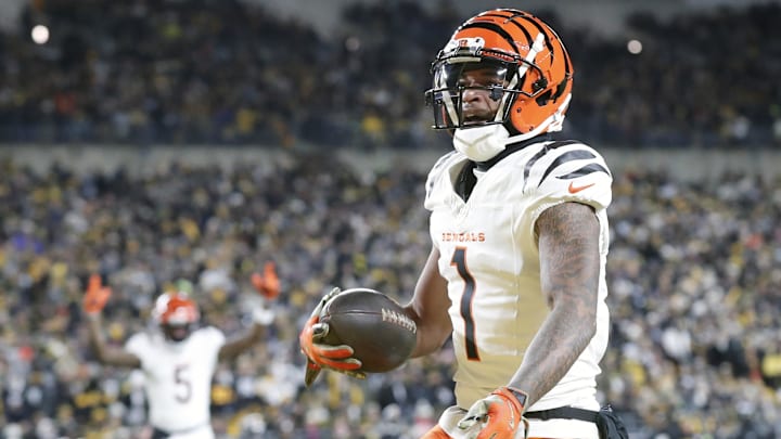 Cincinnati Bengals wide receiver Ja'Marr Chase (1) reacts after catching a touchdown pass against the Pittsburgh Steelers  during the first quarter at Acrisure Stadium. 