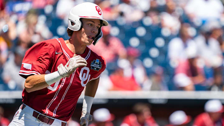 Oklahoma Sooners shortstop Peyton Graham (20) runs after hitting a double.