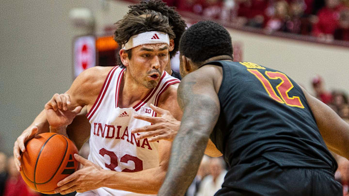 Indiana's Trey Galloway (32) is surrounded by USC defenders including Rashaun Agee (30) during the Indiana versus University of Southern California men's basketball game at Simon Skjodt Assembly Hall on Wednesday, Jan. 8, 2025.