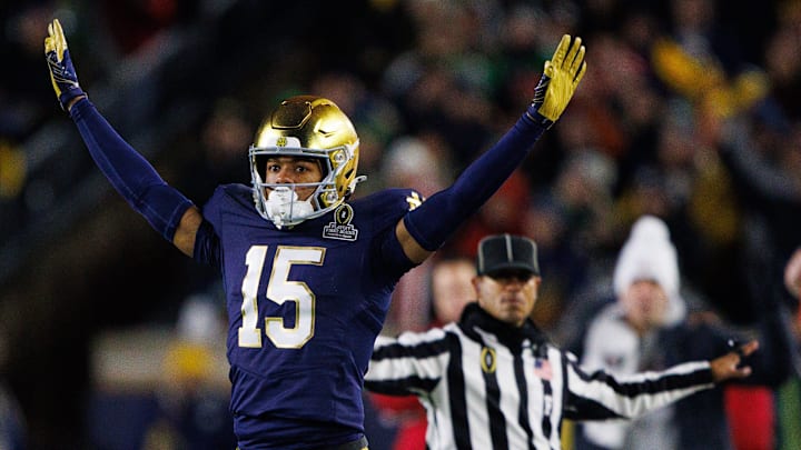 Notre Dame cornerback Leonard Moore (15) celebrates interrupting a reception attempt during the first round of the College Football Playoff between Notre Dame and Indiana at Notre Dame Stadium on Friday, Dec. 20, 2024, in South Bend.