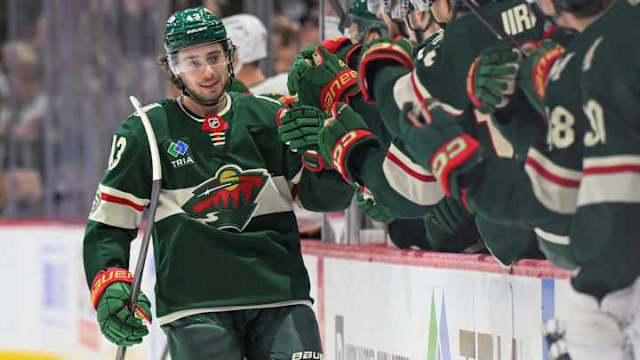 Dec 14, 2025; Saint Paul, Minnesota, USA;  Minnesota Wild defensemen Quinn Hughes (43) celebrates after scoring a goal against the Boston Bruins during the third period at Grand Casino Arena. Mandatory Credit: Nick Wosika-Imagn Images

