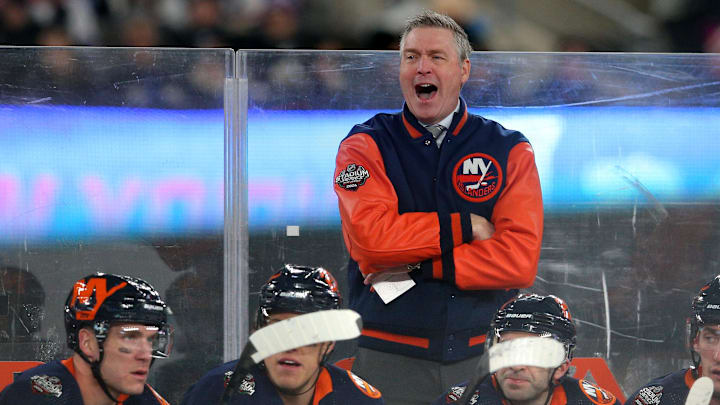 New York Islanders head coach Patrick Roy coaches against the New York Rangers during a Stadium Series game.