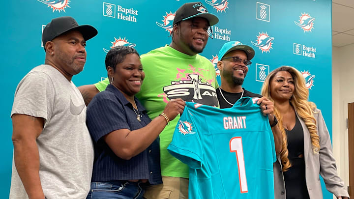 Miami Dolphins first-round pick Kenneth Grant with his family on Friday, April 25, 2025, in Miami Gardens.