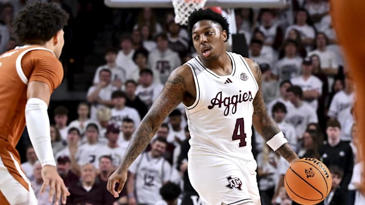 Jan 4, 2025; College Station, Texas, USA; Texas A&M Aggies guard Wade Taylor IV (4) sets the play during the first half against the Texas Longhorns at Reed Arena. The Aggies defeated the Longhorns 80-60. Mandatory Credit: Maria Lysaker-Imagn Images 