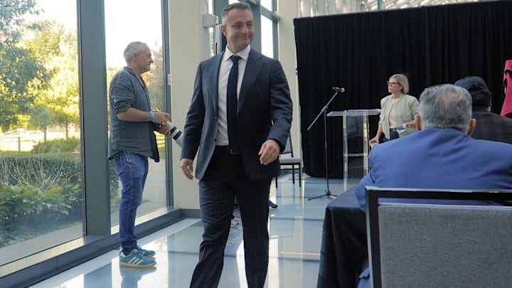 Sep 29, 2025; Toronto, Ontario, Canada; Toronto Raptors head coach Darko Rajakovic smiles at a journalist as he leaves the media day press conference at Hotel X. Mandatory Credit: John E. Sokolowski-Imagn Images