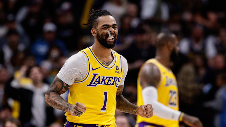 Apr 29, 2024; Denver, Colorado, USA; Los Angeles Lakers guard D'Angelo Russell (1) reacts after a play in the third quarter against the Denver Nuggets during game five of the first round for the 2024 NBA playoffs at Ball Arena. Mandatory Credit: Isaiah J. Downing-Imagn Images Apr 29, 2024; Denver, Colorado, USA; Los Angeles Lakers guard D'Angelo Russell (1) reacts after a play in the third quarter against the Denver Nuggets during game five of the first round for the 2024 NBA playoffs at Ball Arena. Mandatory Credit: Isaiah J. Downing-Imagn Images