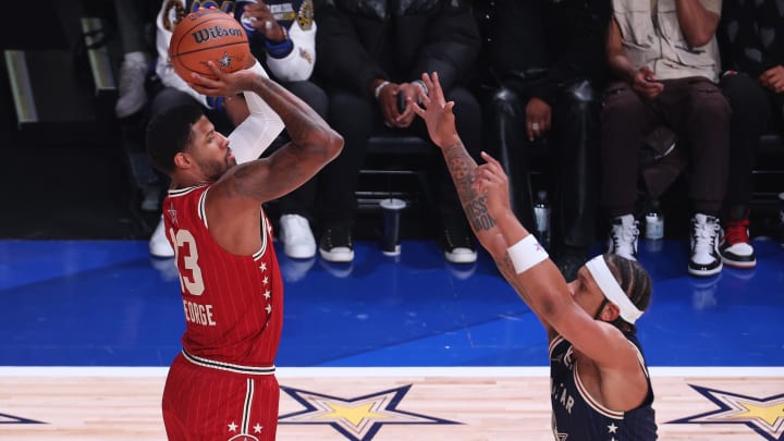 Western Conference forward Paul George (13) of the LA Clippers shoots the ball against Eastern Conference forward Paolo Banchero (5) of the Orlando Magic during the third quarter in the 73rd NBA All-Star game at Gainbridge Fieldhouse. Western Conference forward Paul George (13) of the LA Clippers shoots the ball against Eastern Conference forward Paolo Banchero (5) of the Orlando Magic during the third quarter in the 73rd NBA All-Star game at Gainbridge Fieldhouse.