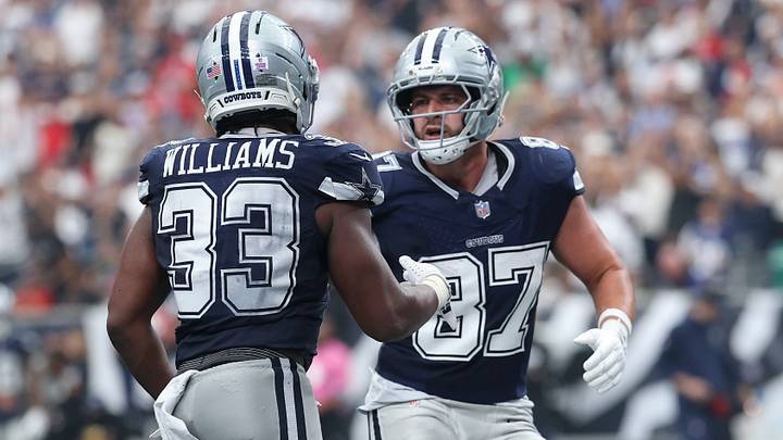 Dallas Cowboys running back Javonte Williams (33) reacts with tight end Jake Ferguson (87) after scoring a touchdown against the Houston Texans during the second half at Reliant Stadium. Dallas Cowboys running back Javonte Williams (33) reacts with tight end Jake Ferguson (87) after scoring a touchdown against the Houston Texans during the second half at Reliant Stadium.
