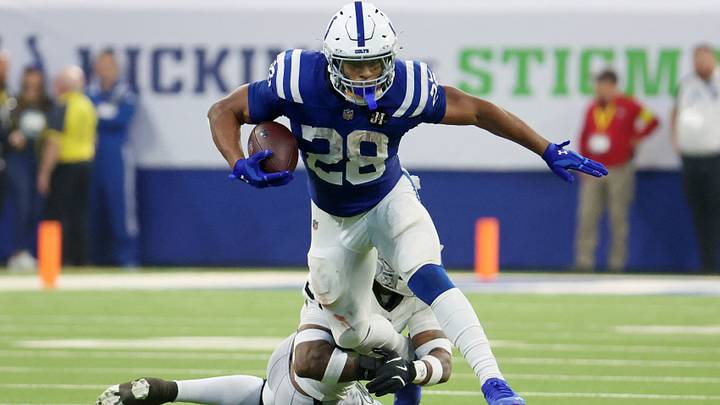 Oct 5, 2025; Indianapolis, Indiana, USA; Indianapolis Colts running back Jonathan Taylor (28) runs with the ball against the Las Vegas Raiders during the second half at Lucas Oil Stadium. Mandatory Credit: Trevor Ruszkowski-Imagn Images Oct 5, 2025; Indianapolis, Indiana, USA; Indianapolis Colts running back Jonathan Taylor (28) runs with the ball against the Las Vegas Raiders during the second half at Lucas Oil Stadium. Mandatory Credit: Trevor Ruszkowski-Imagn Images