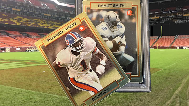 Emmitt Smith and Shannon Sharpe are two of the five rookies included in the 1990 Action Packed Rookie Update set to be inducted into the Pro Football Hall of Fame. Emmitt Smith and Shannon Sharpe are two of the five rookies included in the 1990 Action Packed Rookie Update set to be inducted into the Pro Football Hall of Fame.