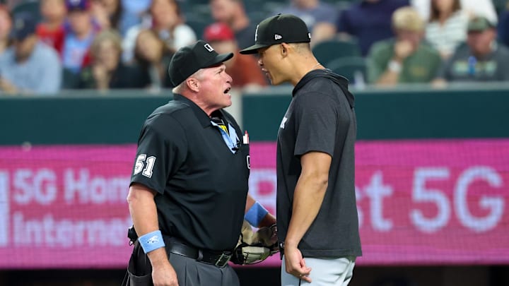 Chicago White Sox manager Will Venable argues with home plate umpire Marvin Hudson during the first inning against the Texas Rangers.