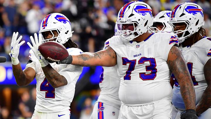 Buffalo Bills offensive tackle Dion Dawkins celebrates a touchdown scored by running back James Cook III against the Rams. Buffalo Bills offensive tackle Dion Dawkins celebrates a touchdown scored by running back James Cook III against the Rams.