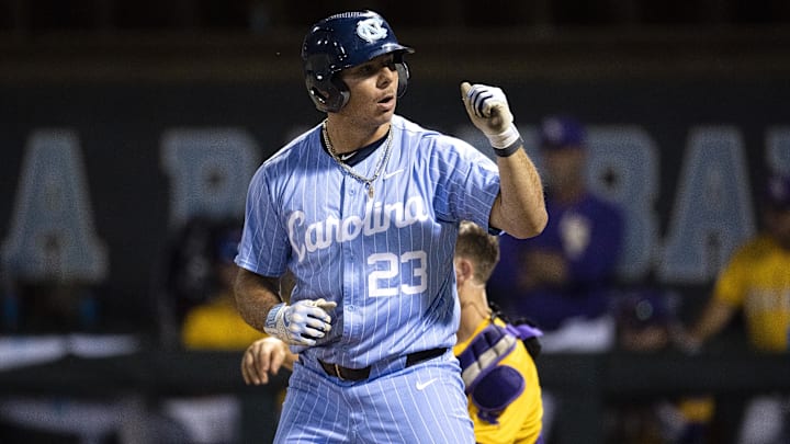 Jun 2, 2024; Chapel Hill, NC, USA; North Carolina Tar Heels designated hitter Alberto Osuna (23) reacts to earning a walk against the Louisiana State Tigers  in the ninth inning of the Div. I NCAA baseball regional at Boshamer Stadium.  Mandatory Credit: Jeffrey Camarati-USA TODAY Sports

