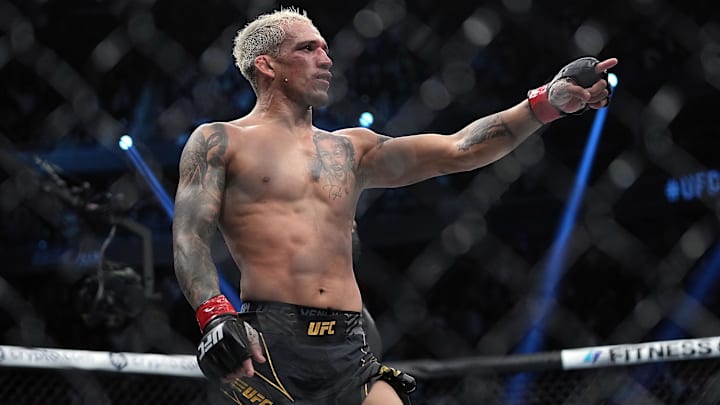 Dec 11, 2021; Las Vegas, Nevada, USA; Charles Oliveira celebrates his victory by submission against