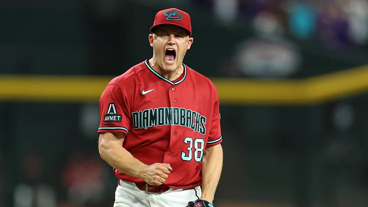 May 23, 2026; Phoenix, Arizona, USA; Arizona Diamondbacks relief pitcher Paul Sewald (38) reacts after defeating the Colorado Rockies in the ninth inning at Chase Field. Mandatory Credit: Anna Carrington-Imagn Images
