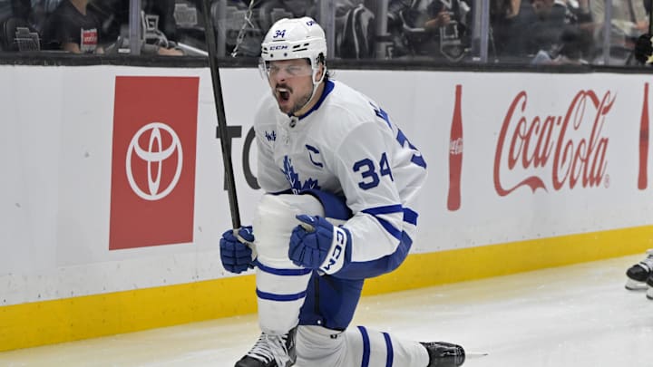 Mar 29, 2025; Los Angeles, California, USA; Toronto Maple Leafs center Auston Matthews (34) celebrates after scoring the go-ahead goal in the third period against the Los Angeles Kings at Crypto.com Arena. Mandatory Credit: Jayne Kamin-Oncea-Imagn Images