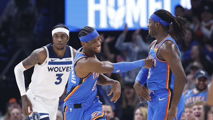 Dec 26, 2023; Oklahoma City, Oklahoma, USA; Oklahoma City Thunder guard Shai Gilgeous-Alexander (2) celebrates with guard Luguentz Dort (5) after Luguentz Dort made a three point basket against the Minnesota Timberwolves during the second quarter at Paycom Center. Mandatory Credit: Alonzo Adams-Imagn Images Dec 26, 2023; Oklahoma City, Oklahoma, USA; Oklahoma City Thunder guard Shai Gilgeous-Alexander (2) celebrates with guard Luguentz Dort (5) after Luguentz Dort made a three point basket against the Minnesota Timberwolves during the second quarter at Paycom Center. Mandatory Credit: Alonzo Adams-Imagn Images