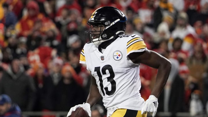 Jan 16, 2022; Kansas City, Missouri, USA; Pittsburgh Steelers wide receiver James Washington (13) returns to the sidelines after scoring against the Kansas City Chiefs in an AFC Wild Card playoff football game at GEHA Field at Arrowhead Stadium. Mandatory Credit: Denny Medley-USA TODAY Sports