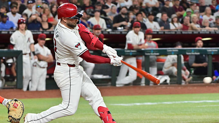 Sep 25, 2024; Phoenix, Arizona, USA; Arizona Diamondbacks first base Christian Walker (53) hits an RBI single in the fourth inning against the San Francisco Giants at Chase Field. Sep 25, 2024; Phoenix, Arizona, USA; Arizona Diamondbacks first base Christian Walker (53) hits an RBI single in the fourth inning against the San Francisco Giants at Chase Field.