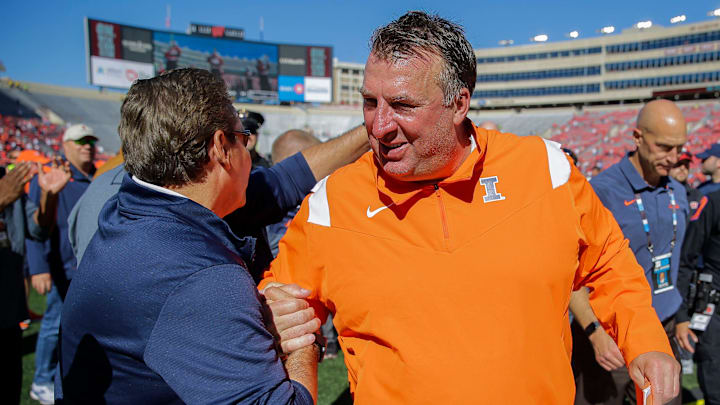 Illinois head coach Bret Bielema celebrates with a supporter as he heads to the locker room after a game against Wisconsin on Saturday, October 1, 2022, at Camp Randall Stadium in Madison, Wis. Illinois won the game, 34-10, in Bielema   s return to Madison after coaching the Badgers from 2006-2012.Tork Mason/USA TODAY NETWORK-Wisconsin

Usat Wisconsin Vs Illinois Football 100122 2932 Ttm