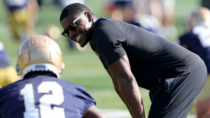 Deland McCullough smiles at a Notre Dame practice with running back Jeremiyah Love, who was drafted in the first round of the 2026 NFL Draft.