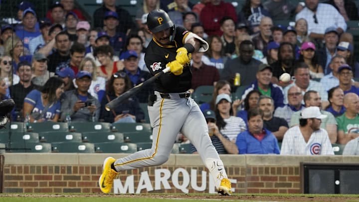 Sep 3, 2024; Chicago, Illinois, USA; Pittsburgh Pirates second base Nick Gonzales (39) hits a single against the Chicago Cubs during the first inning at Wrigley Field. Mandatory Credit: David Banks-Imagn Images Sep 3, 2024; Chicago, Illinois, USA; Pittsburgh Pirates second base Nick Gonzales (39) hits a single against the Chicago Cubs during the first inning at Wrigley Field. Mandatory Credit: David Banks-Imagn Images