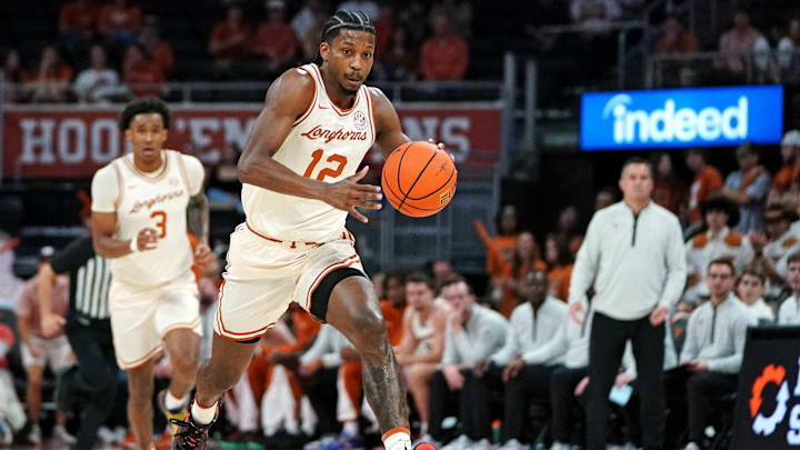 Texas Longhorns guard Tramon Mark drives the ball to the basket against Rider Broncs guard Flash Burton during the first half at Moody Center