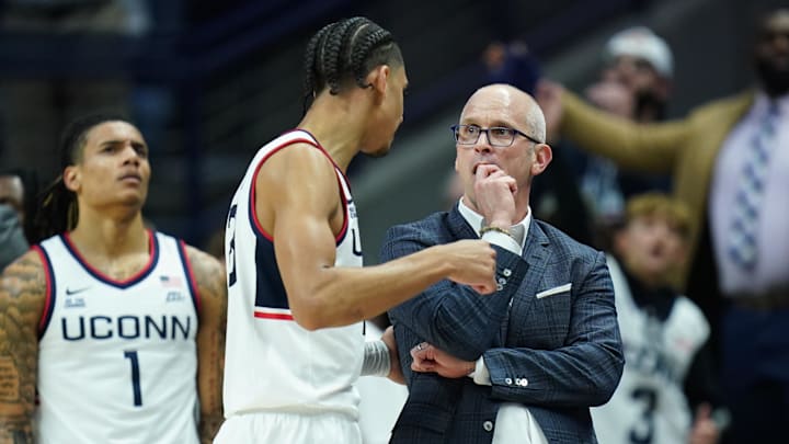Dec 4, 2024; Storrs, Connecticut, USA; UConn Huskies head coach Dan Hurley talks with forward Jayden Ross (23) from the sideline as they take on the Baylor Bears at Harry A. Gampel Pavilion. Mandatory Credit: David Butler II-Imagn Images