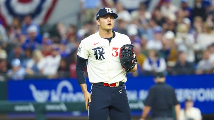 Mar 28, 2025; Arlington, Texas, USA;  Texas Rangers starting pitcher Jack Leiter (35) reacts during the game against the Boston Red Sox at Globe Life Field.