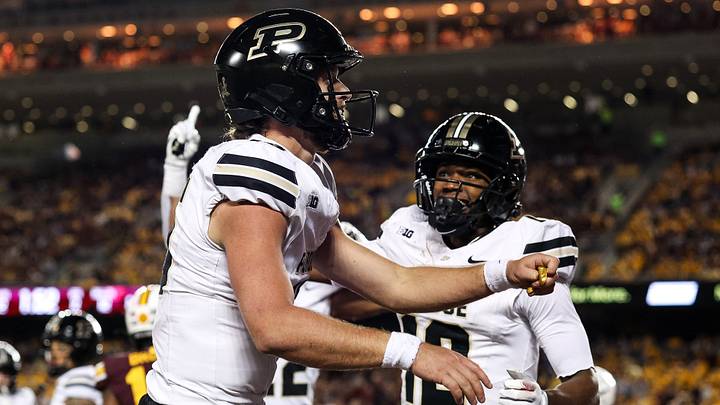 Purdue Boilermakers quarterback Ryan Browne (15) celebrates his touchdown against the Minnesota Golden Gophers. Purdue Boilermakers quarterback Ryan Browne (15) celebrates his touchdown against the Minnesota Golden Gophers.