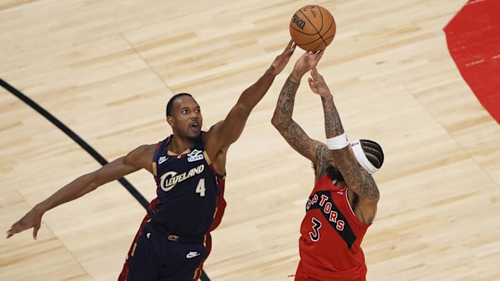Nov 24, 2025; Toronto, Ontario, CAN; Cleveland Cavaliers forward Evan Mobley (4) tries to block a shot by Toronto Raptors forward Brandon Ingram (3) during the second half at Scotiabank Arena. Mandatory Credit: John E. Sokolowski-Imagn Images